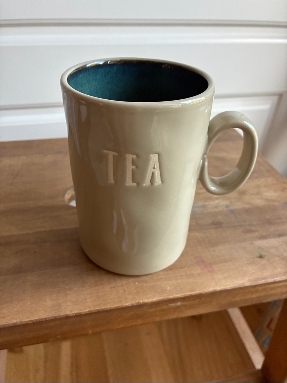 Rae Dunn Tea Stoneware Mug in Cream with Blue Interior